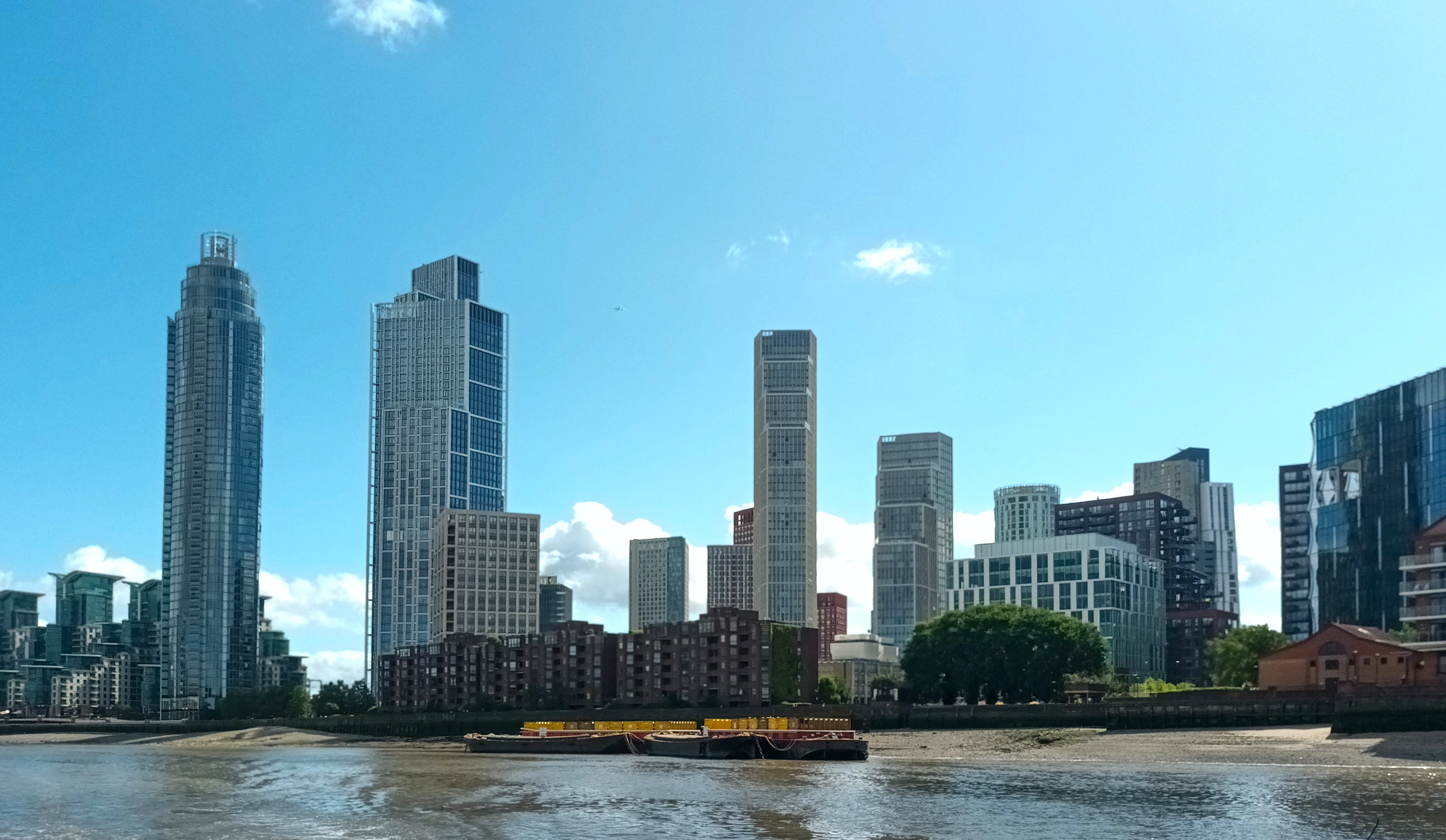 Panoramic view of One Nine Elms towers under construction against the London skyline